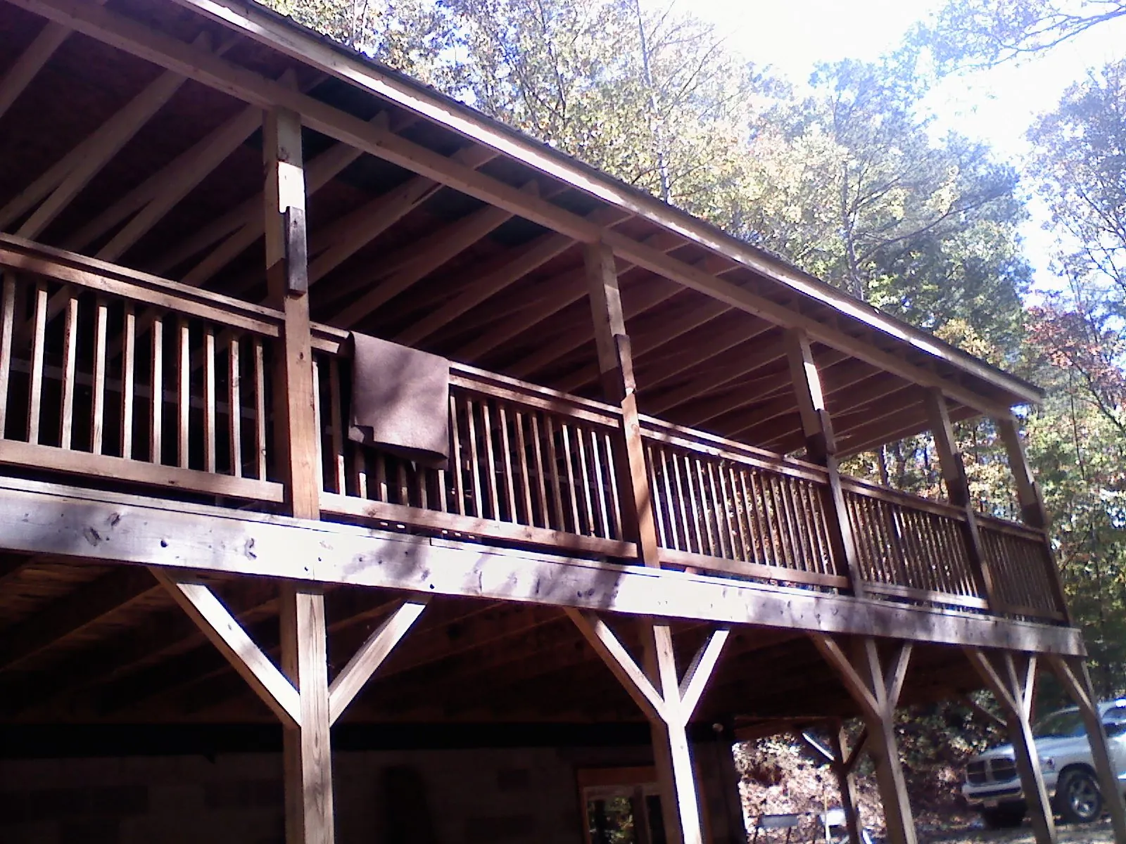 Timber framing under a new elevated porch and deck — Roof Leak Repair in Flowery Branch by Roofing Brothers